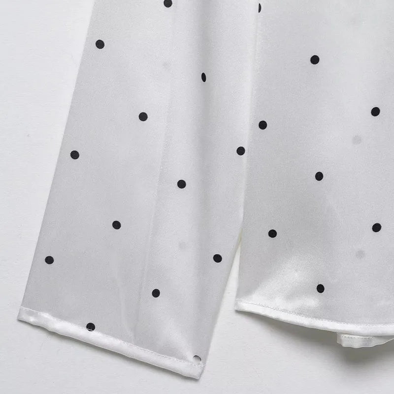Blusa lunares con lazada al cuello