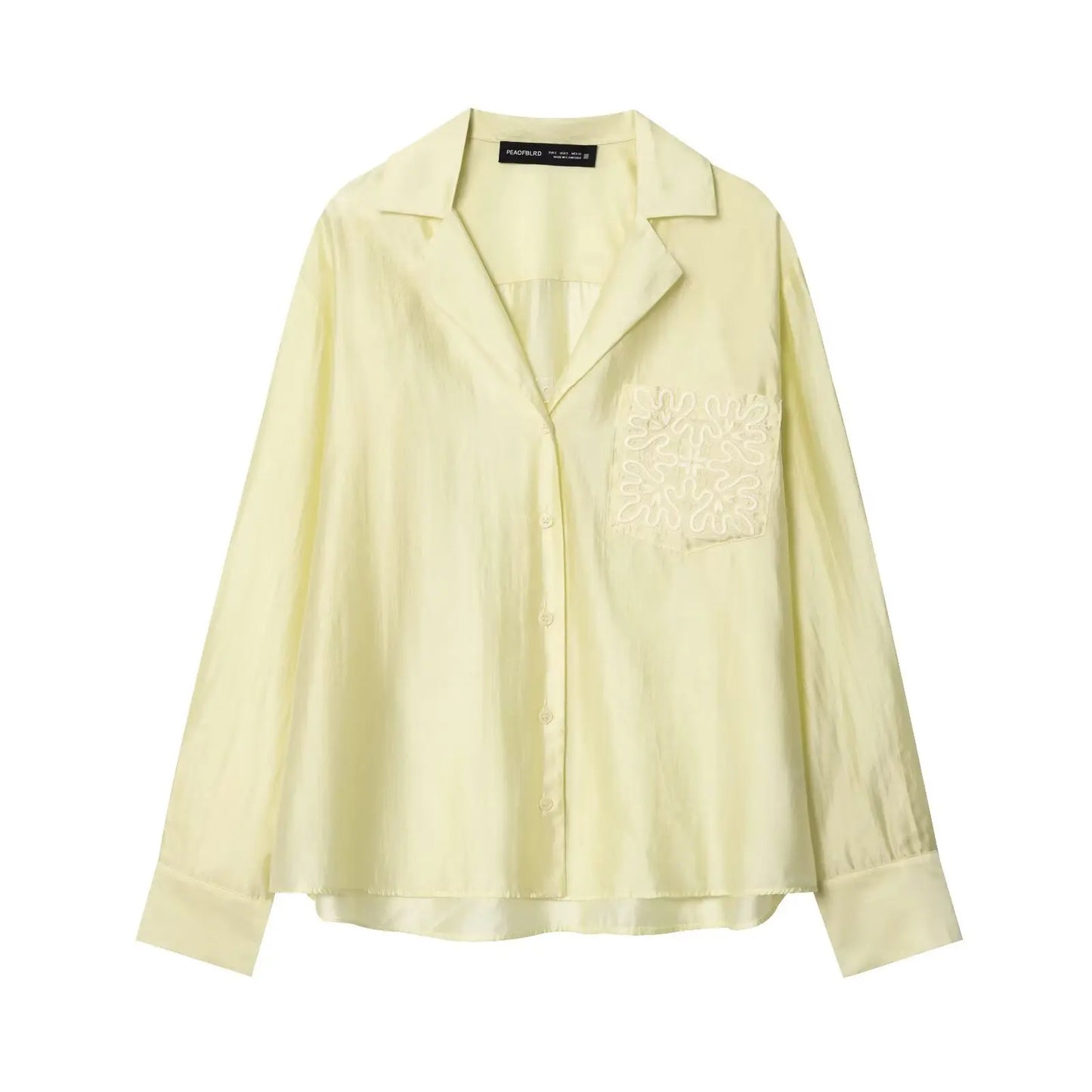 Camisa ligera con bolsillo bordado