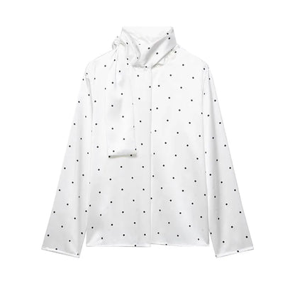 Blusa lunares con lazada al cuello